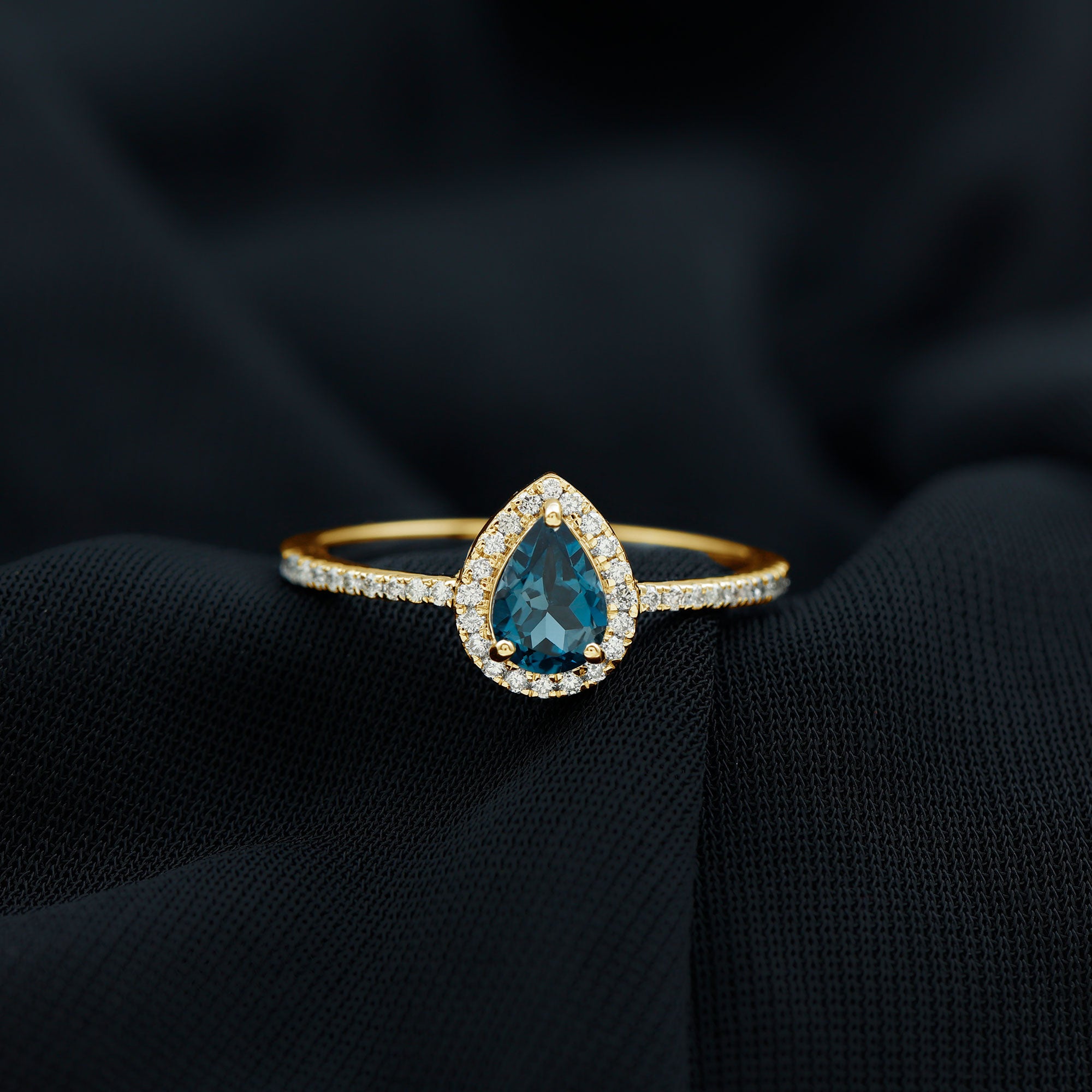 Rosec Jewels-Pear Shaped London Blue Topaz Engagement Ring With Moissanite